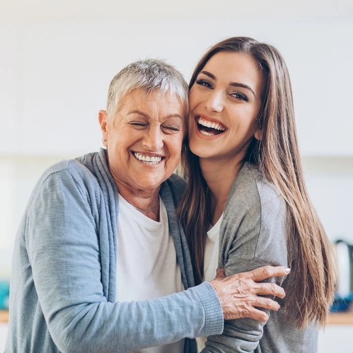 Implant dentures in West Jordan, UT securely fitted in a patient’s mouth